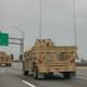 Illustration for article titled Armored Humvee Convoy Flying Trump Flag Belonged To Navy SEAL Unit